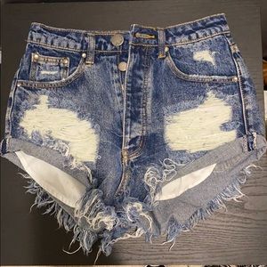 Distressed high waisted shorts fits size 0-1